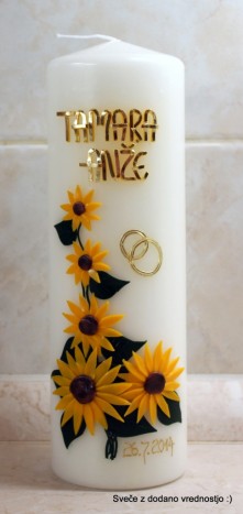 Poročna sveča v znamenju sončnic in v istem stilu tudi krstna sveča - 